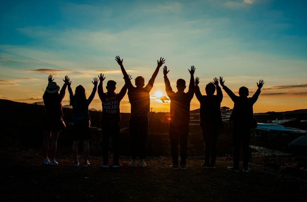 Group celebrating in the Arizona sunset